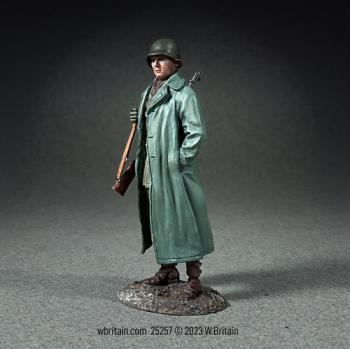 U.S. Infantryman Standing with Raincoat over Equipment--single figure #0