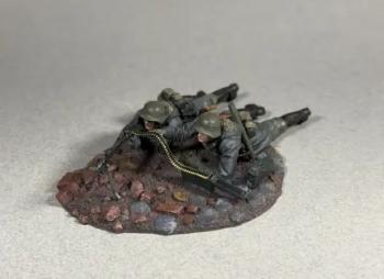 Image of "Hitler's Buzz Saw"--Waffen SS MG42 Team Firing Prone, 1942-45--two figures on scenic base Image of "Hitler's Buzz Saw"--Waffen SS MG42 Team Firing Prone, 1942-45--two figures on scenic base