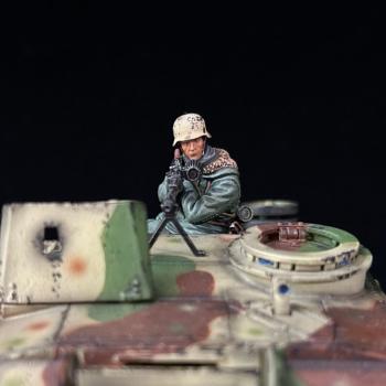 Image of Tank Rider Machine Gunner. The Stug III Assault Gun, Battle of Kharkov--single kneeling figure with MG propped on tank Image of Tank Rider Machine Gunner. The Stug III Assault Gun, Battle of Kharkov--single kneeling figure with MG propped on tank
