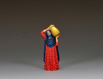 An Arab Woman Carrying Water--single figure carrying a jug on her left shoulder #51804