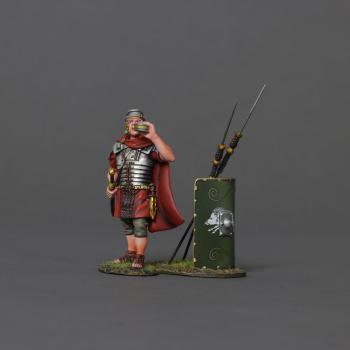 Image of Roman Soldier Wearing Cloak and Drinking from Canteen--cloaked figure and 20th Legion green shield with two leaning spears #52084