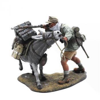 Image of Das Deutsche Afrika Korps Firing Over Donkey, North Afrika, 1941-1943--single standing figure firing rifle over laden donkey  #52891