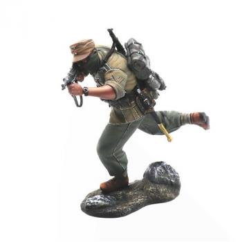 Image of Das Deutsche Afrika Korps Advancing Firing MP 40, North Afrika, 1941-1943--single running figure with bandana over face #52894