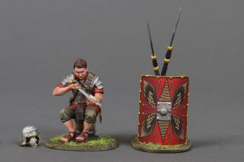 The Swordsman (A)--single Roman Legionary figure in Red tunic sitting on a bucket cleaning his Gladius sword and two pila leaning on red shield #53057