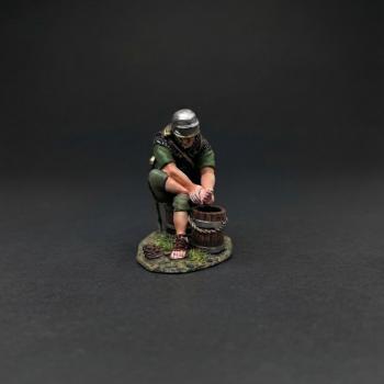 The Washerman in Green Tunic (D)--single Roman Legionary figure seated on bucket & washing clothes #53378
