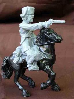 Mounted Cossack of the Napoleonic Era--single mounted plastic figure with sprue of multiple Arms--RETIRED--THREE IN STOCK. #2159